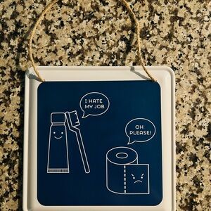 Blue and White Hanging Sign with Humorous Print